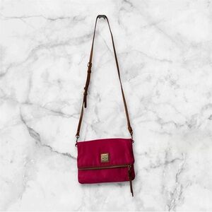 Dooney & Bourke Miramar
Foldover Zip Crossbody Fushia